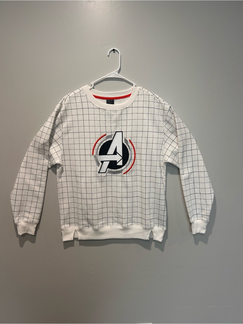 Marvel White Crewneck Sweater with Black Grid and Red Accents